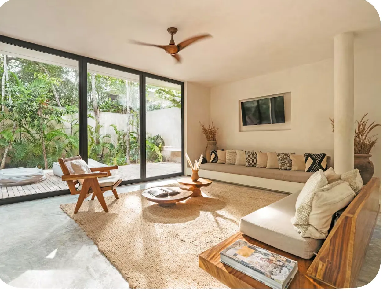 Open living room looking onto the pool at Casa Areca
