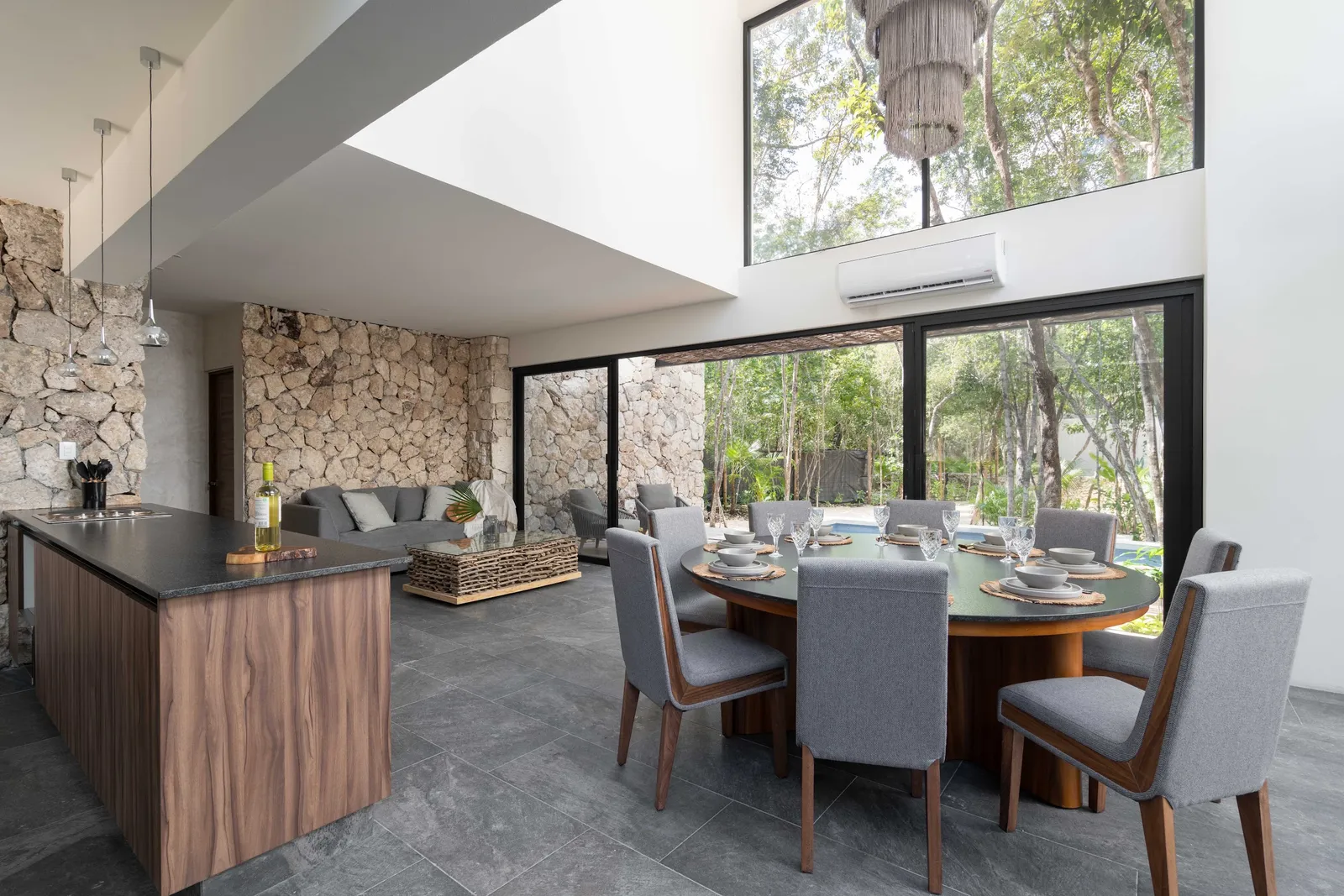 Dining table and open kitchen at Villas Twelve #4